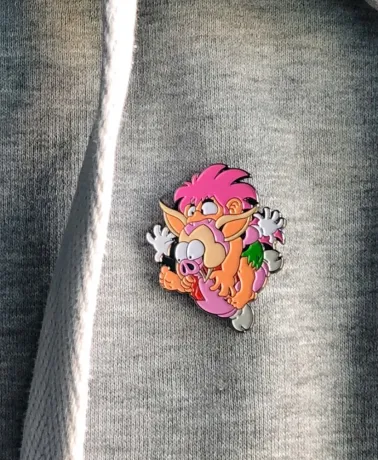 TOMBA! - Tomba Leaping on a Pig enamel metal Pin Badge