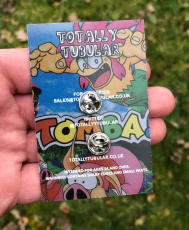 TOMBA! - Tomba Leaping on a Pig enamel metal Pin Badge
