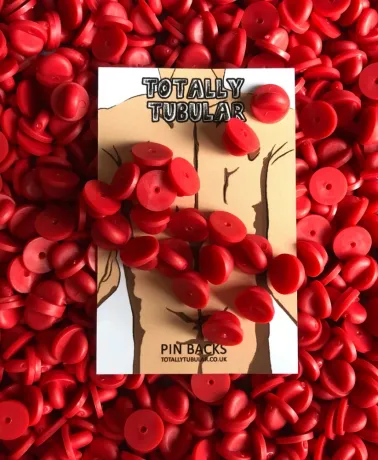 Red Rubber push on pin badge backs