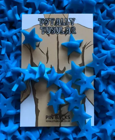 Light Blue Star Shaped Rubber push on pin badge backs
