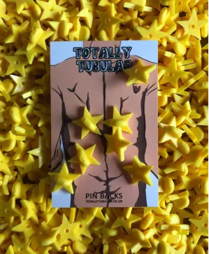 Yellow Star Shaped Rubber push on pin badge backs